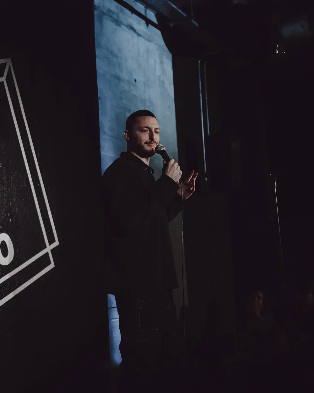 A comedian performing at 21Soho Presents