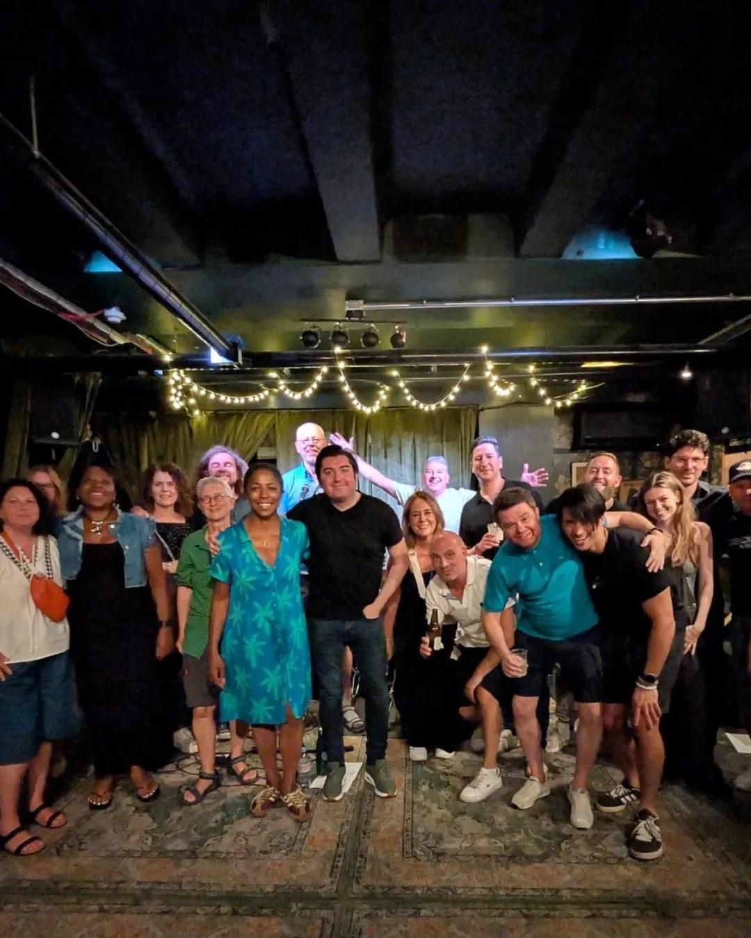 A group at a private party in the Green Room at 21Soho