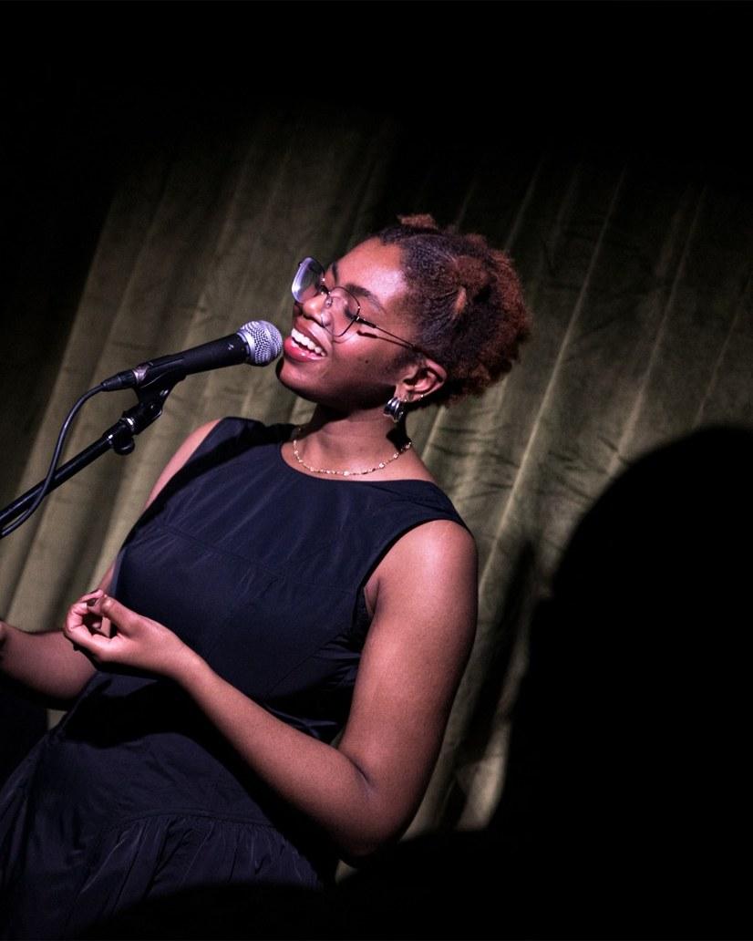 A singer performing in the Green Room at 21Soho