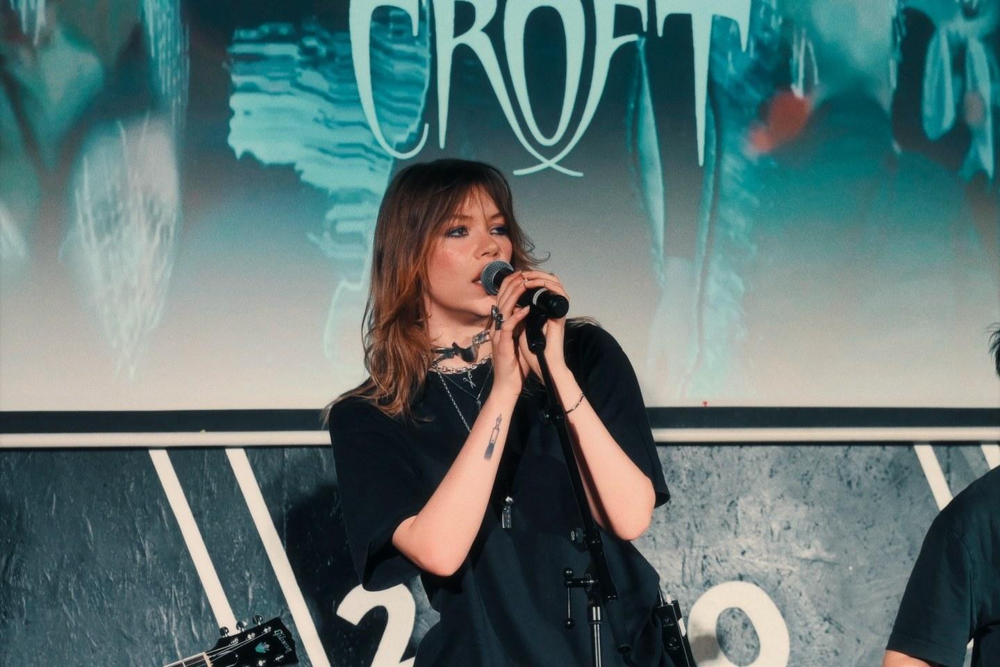 A singer performing with her band in the Main Room at 21Soho